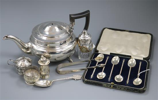 A silver teapot, a small quantity of other silver items and a 9ct gold-cased Majex wristwatch